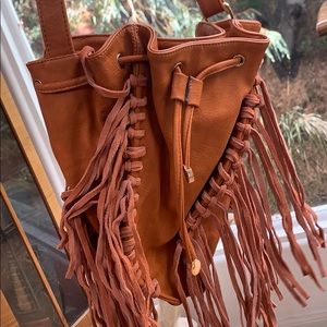 Leather moccasin style purse never used